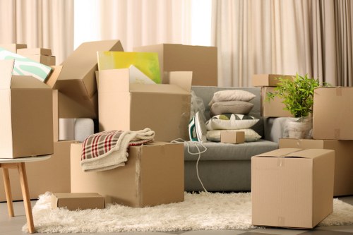 Professional movers loading furniture for a Bloomsbury flat move